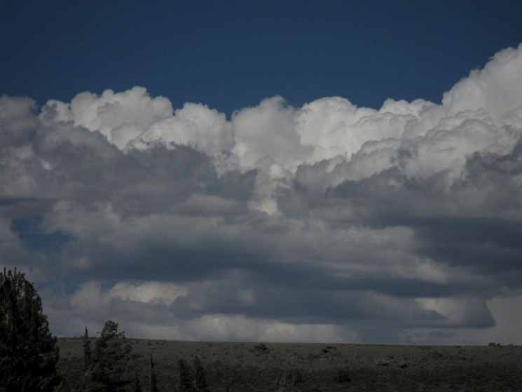 Summer heat clouds coming up from the Valley.